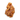 A raw, irregularly shaped gold nugget with embedded pinkish-brown mineral inclusions, isolated on a white background with a soft drop shadow.